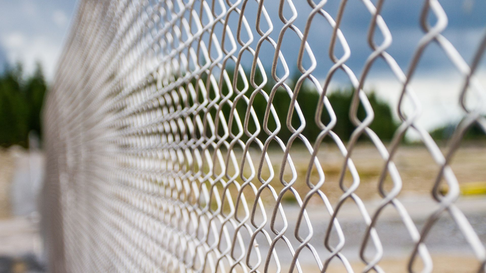 A close up of a chain link fence